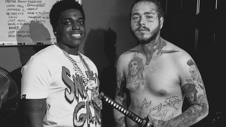 Post Malone and Kodak Black posing