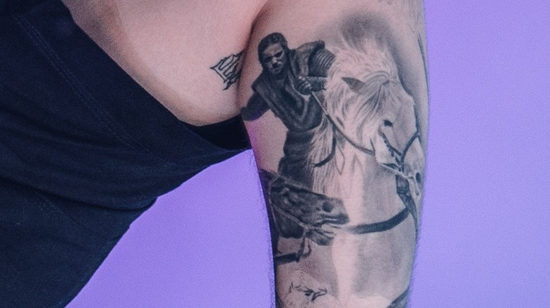 Post Malone's tattoo of himself riding a horse