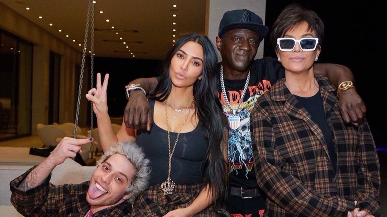 Pete Davidson, Kim Kardashian, Flavor Flav, and Kris Jenner smiling