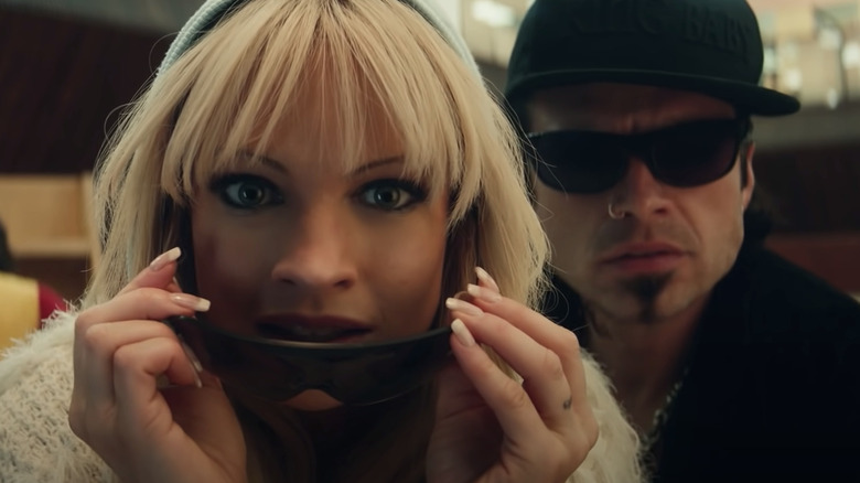 Lily James as Pamela Anderson and Sebastian Stan as Tommy Lee looking shocked