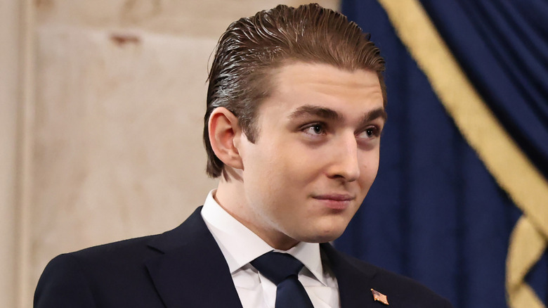 Barron Trump looking animated at the 2025 inauguration.