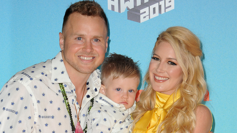 Spencer Pratt, Gunner Pratt, and Heidi Montag posing