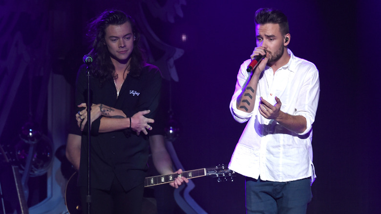 Harry Styles and Liam Payne performing