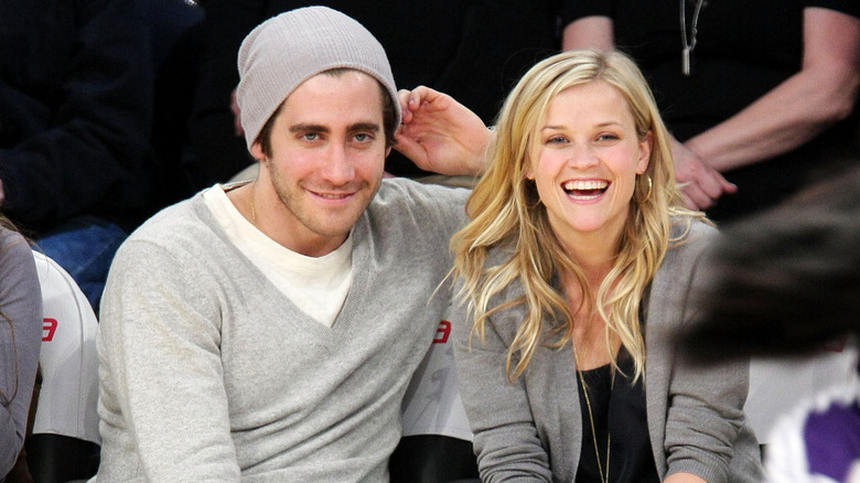 Jake Gyllenhaal and Reese Witherspoon at a game