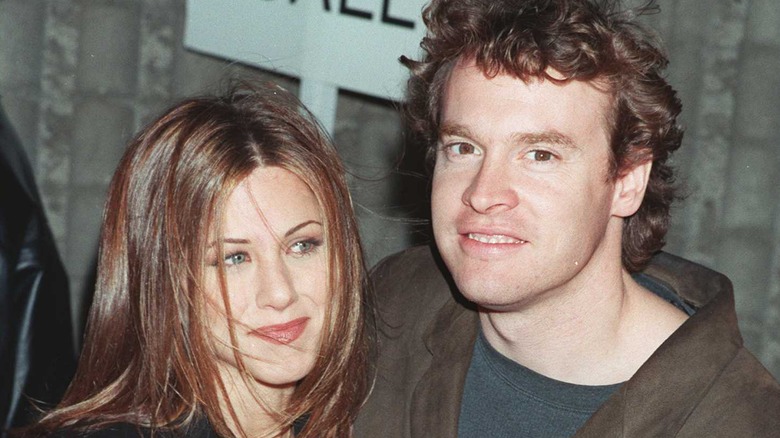 Jennifer Aniston poses with Tate Donovan