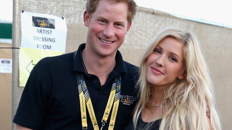 Prince Harry and Ellie Goulding posing