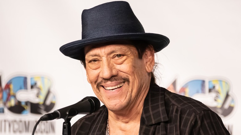 Danny Trejo smiling while speaking