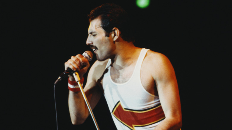 Freddie Mercury performing