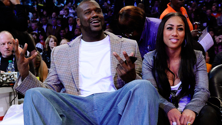 Shaquille O'Neal, Nicole Alexander sitting