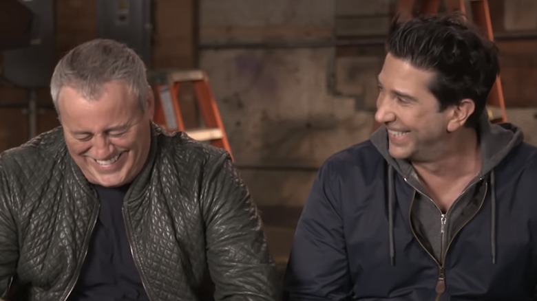 Matt LeBlanc and David Schwimmer laughing during 'Friends: The Reunion'