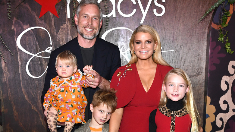 Jessica Simpson and family posing for a photo