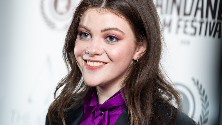 Georgie Henley grinning