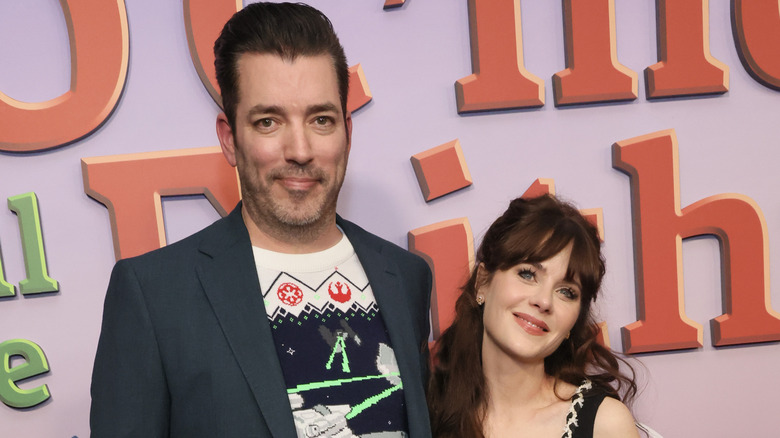 Jonathan Scott posing with Zooey Deschanel