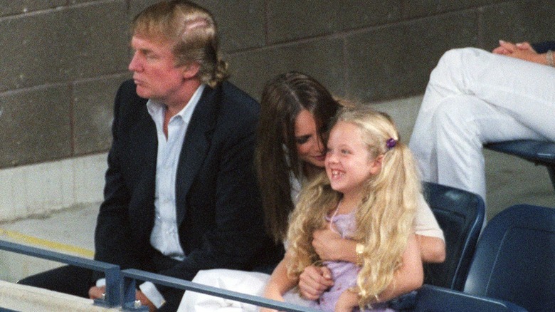 Donald, Melania and Tiffany Trump watching tennis together.