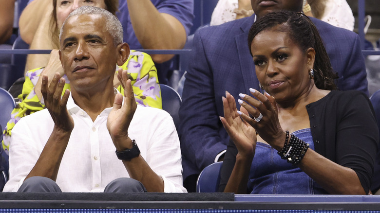 Barack Obama and Michelle Obama attending the men's singles first round at the 2023 U.S. Open