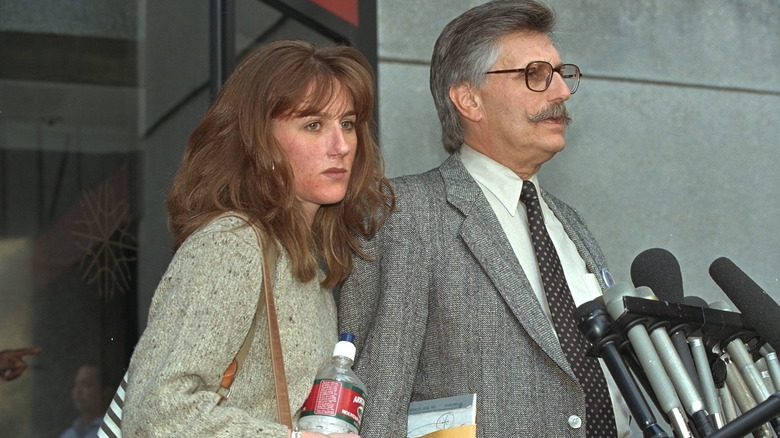 Kim and Fred Goldman talking to reporters