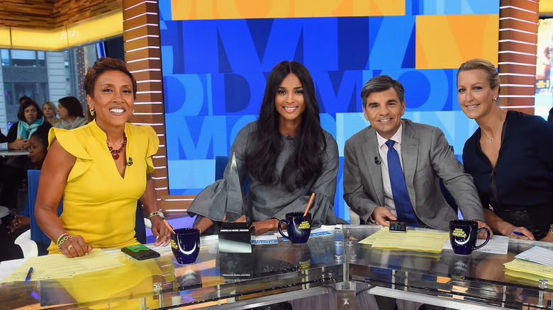 Robin Roberts, Ciara, George Stephanopoulos, and Lara Spencer pose during the 2017 American Music Awards nominations announcement at Good Morning America Studios in 2017