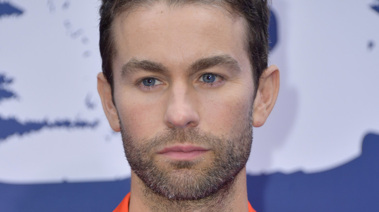 Chace Crawford poses in 2022