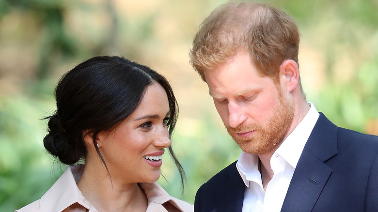 Meghan Markle looking at Prince Harry