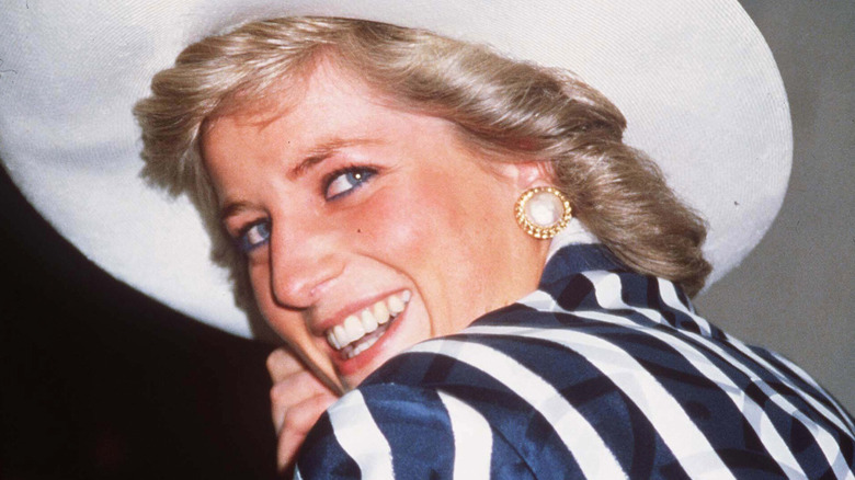 Princess Diana smiling over her shoulder