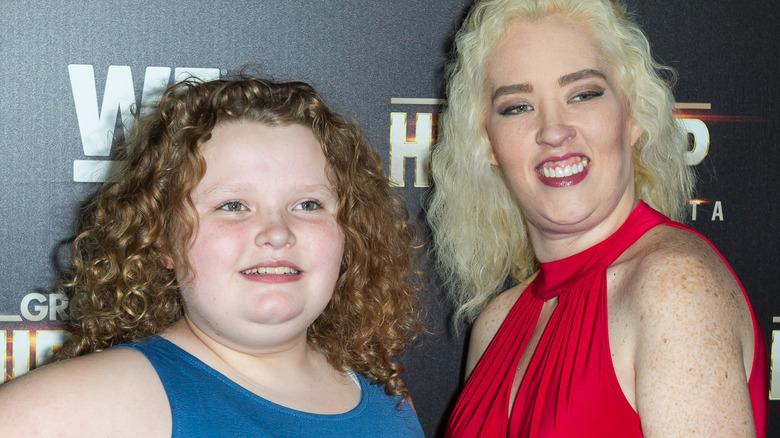 Alana Thompson and Mama June smile at an event