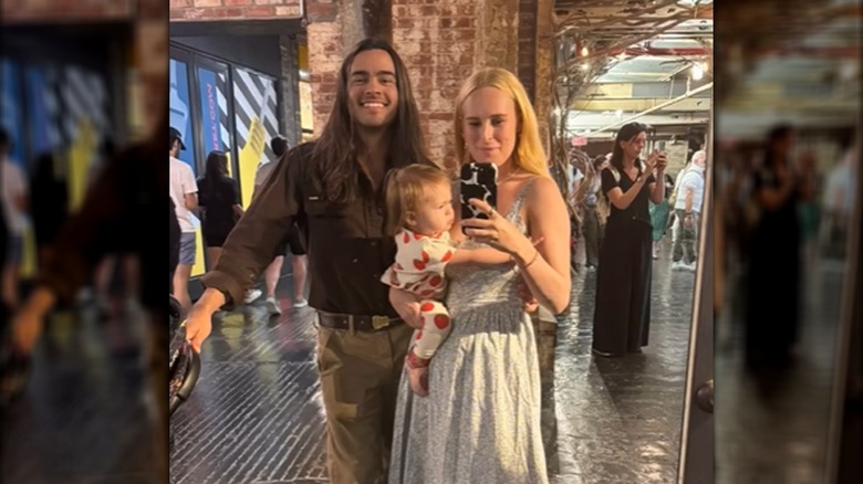 Derek Richard Thomas and Rumer Willis pose with their daughter