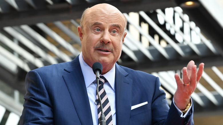 Dr. Phil wearing a suit