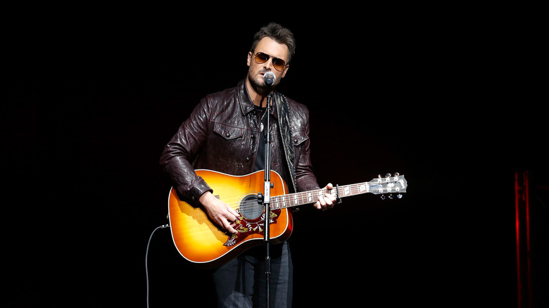 eric church performing guitar