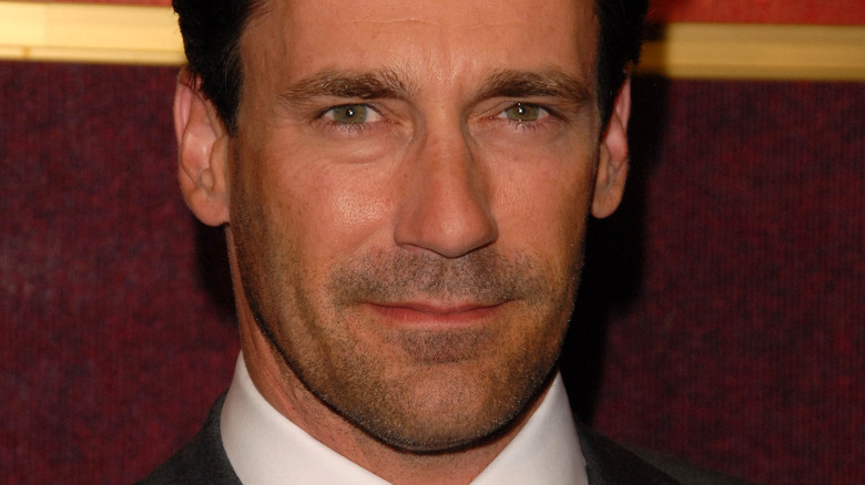 Jon Hamm poses in a suit