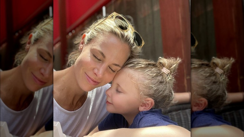 Brooke Burns, daughter Declan with eyes closed