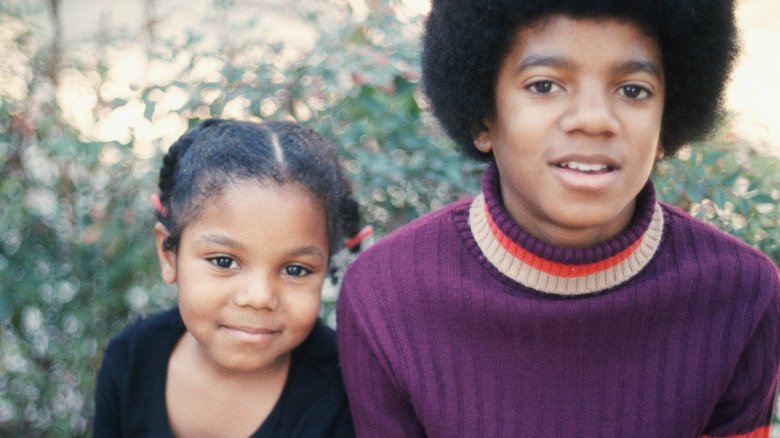 Young Janet and Michael Jackson posing