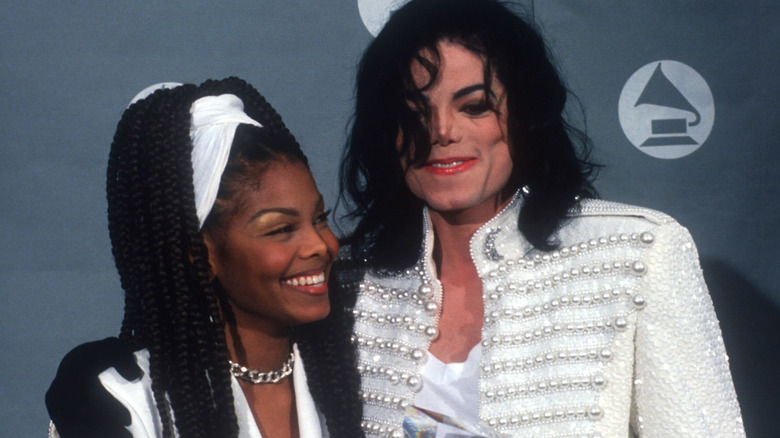 Janet and Michael Jackson smiling