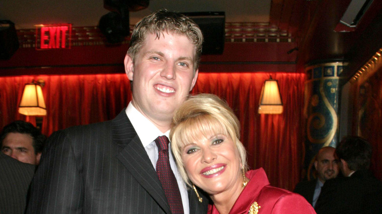 Ivana Trump leaning on smiling Eric Trump