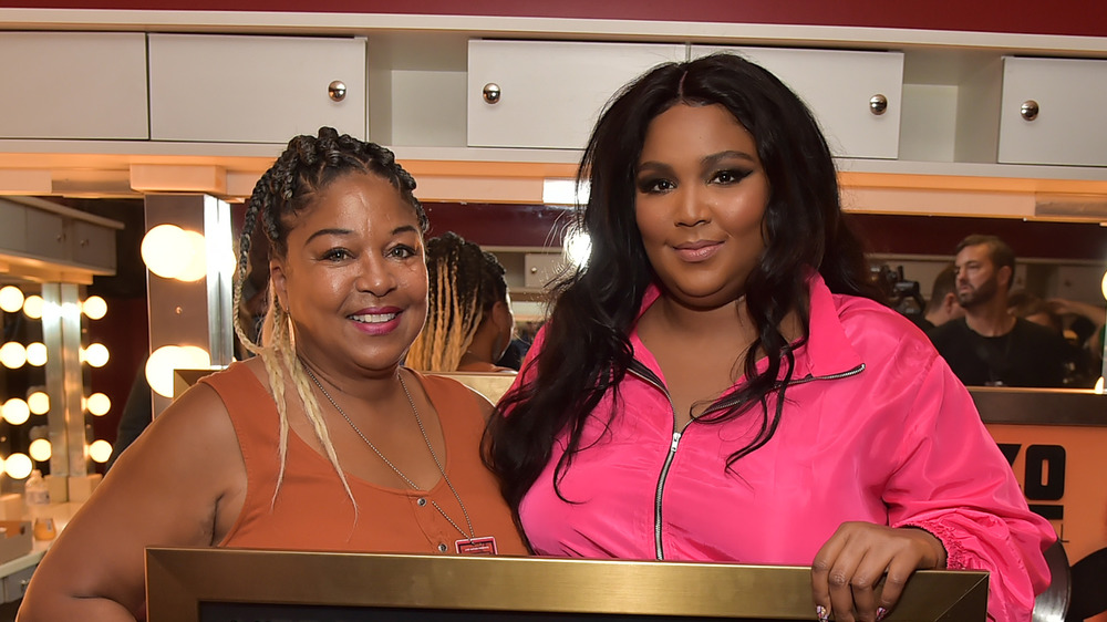 Lizzo and her mom pose together