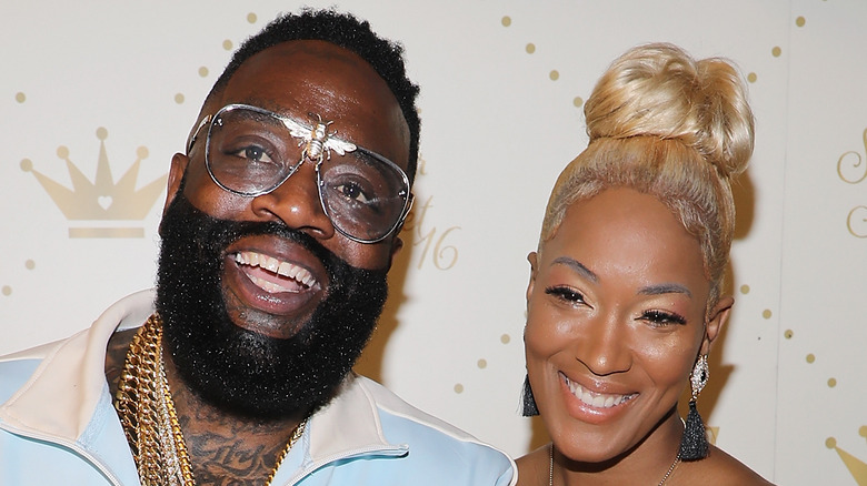 Rick Ross and Briana Camille at an event