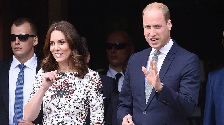 Prince William waving with Kate Middleton