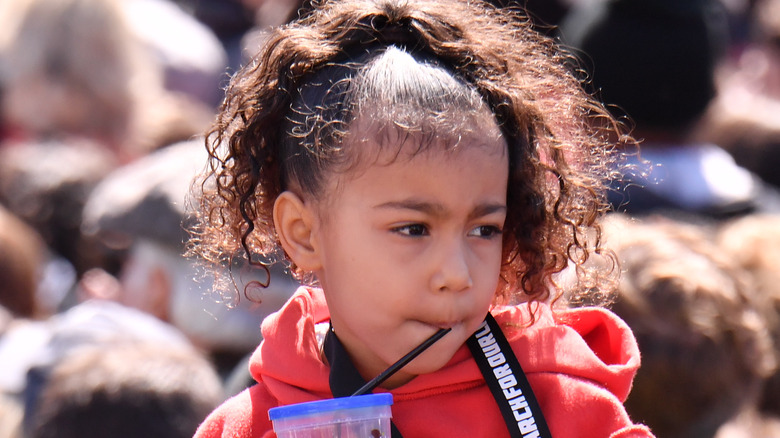 North West at a march in 2018