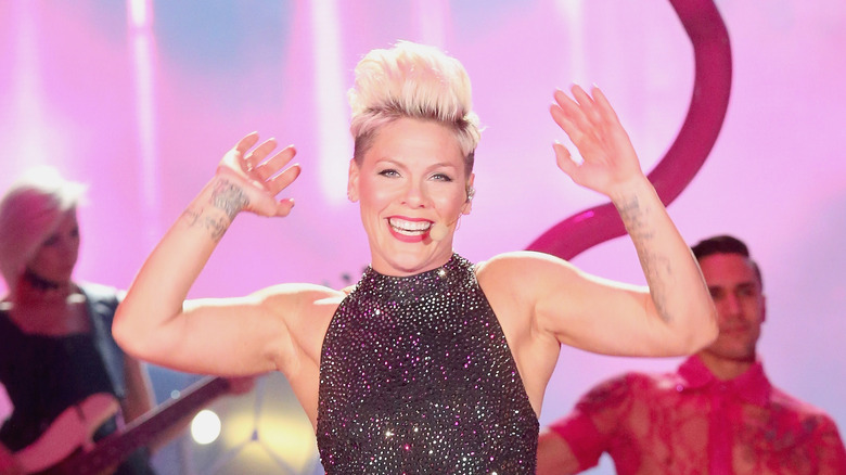 Pink smiling while performing on stage