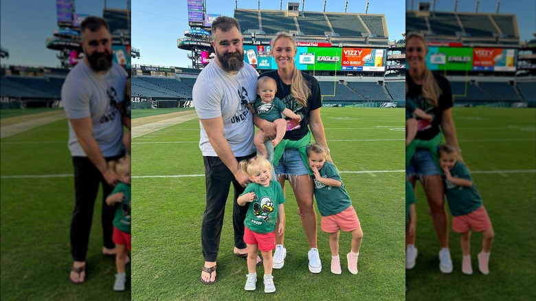 Kelce family posing on field