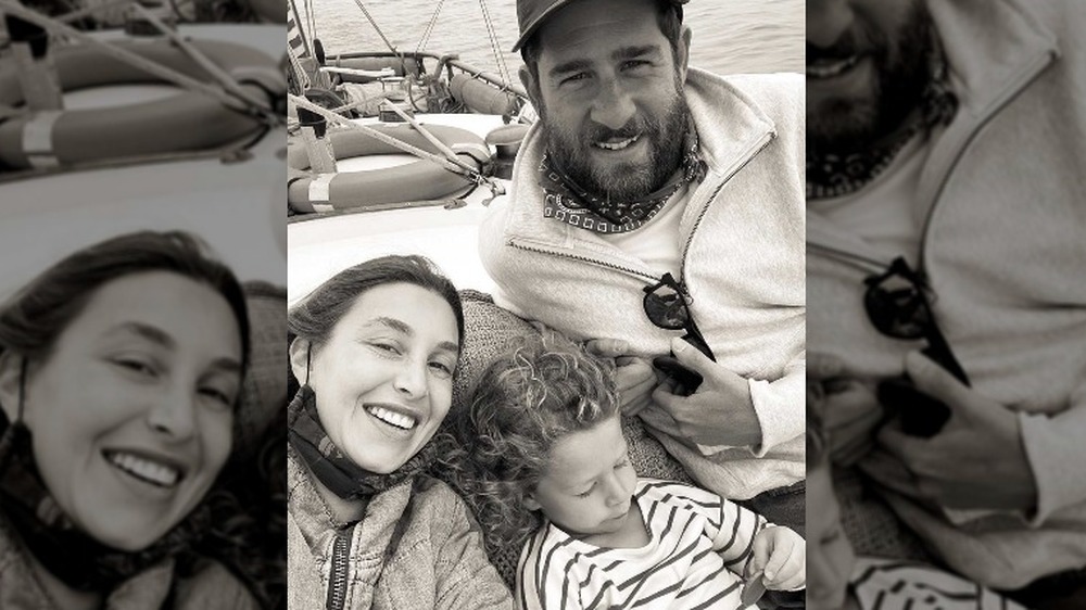 Whitney Port, Tim Rosenman and their son Sonny smiling for the camera in a selfie