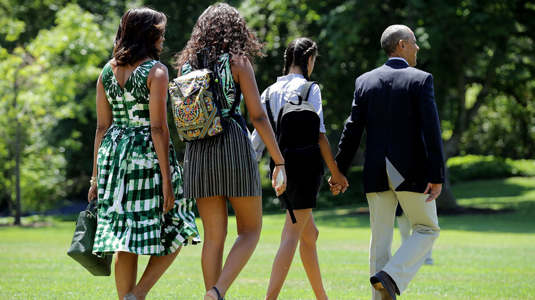 The Obama family walking