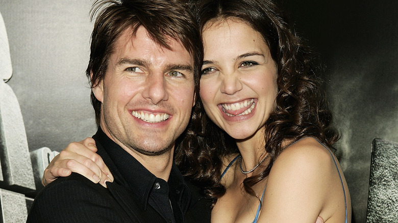 Tom Cruise and Katie Holmes smiling 