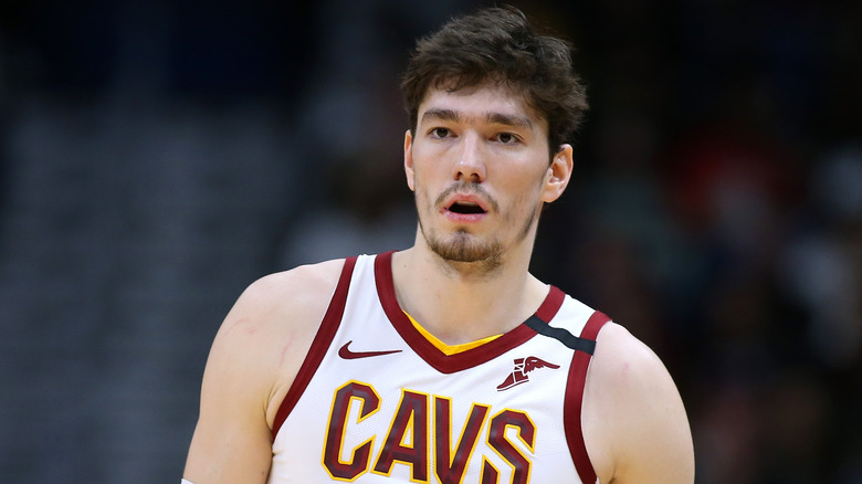 Cedi Osman on the basketball court, looking on