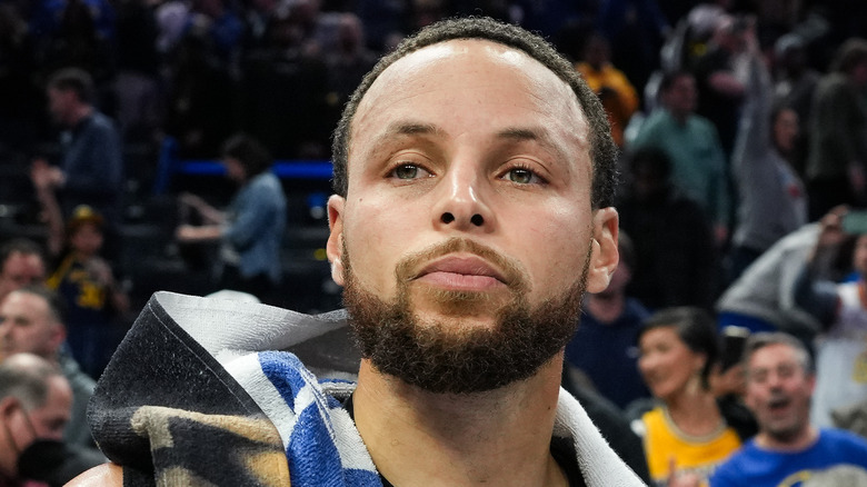 Stephen Curry looking up on the basketball court