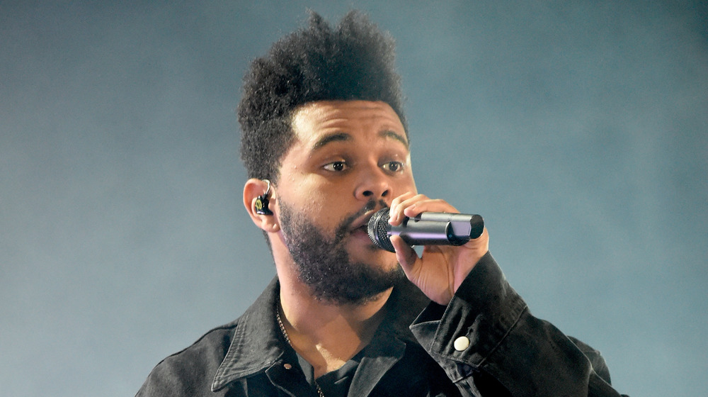 The Weeknd singing on-stage