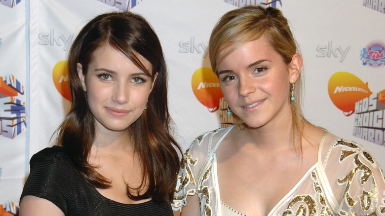 Emma Roberts and Emma Watson smiling