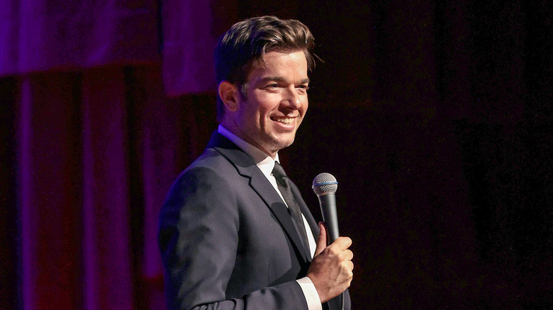 John Mulaney on stage in 2021