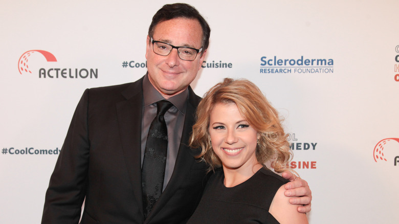 Bob Saget and Jodie Sweetin pose together in 2017