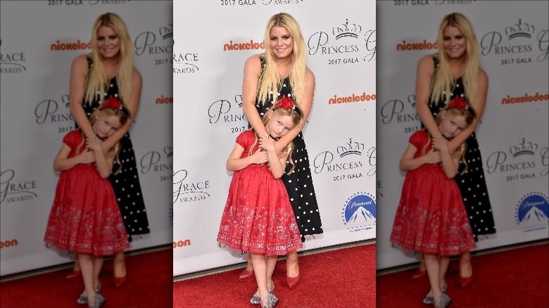 Jessica Simpson poses with Maxwell