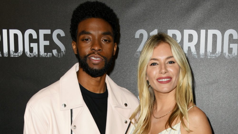 Chadwick Boseman and Sienna Miller